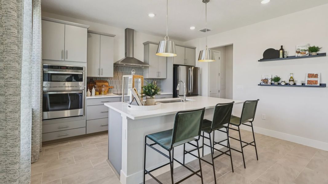 The Mangrove Kitchen at Lakeside at Satilla by DRB Homes in Saint Cloud, FL The Mangrove Kitchen at Lakeside at Satilla by DRB Homes in Saint Cloud, FL
