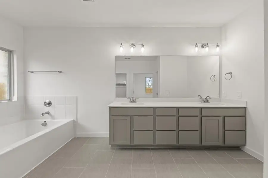 Representative furnished interior of a home built from the Olive III Katy Lakes 50s by Brohn Homes in Katy Lakes, Katy (Image 8).