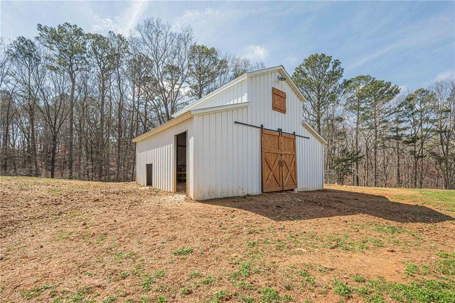 Exterior details and patio area of a home in , Waleska (Image 25).