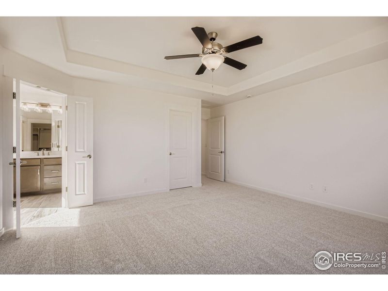 Spacious, unfurnished interior of a new home in RainDance - 60s, Windsor (Image 24).
