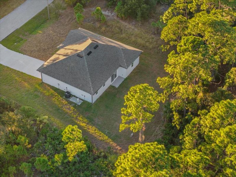 Front exterior of a new home in , North Port, FL, highlighting curb appeal (Image 18). Front exterior of a new home in , North Port, FL, highlighting curb appeal (Image 18).