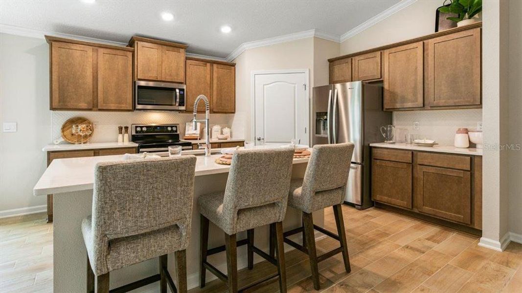 Furnished interior view inside a new home in Sawmill Branch Express, Palm Coast (Image 10).