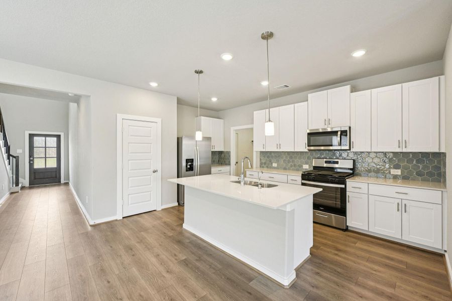 Photo is not of the actual home, but is an inspirational photo of builder’s model home and may depict options, furnishings, and/or decorator features that are not included