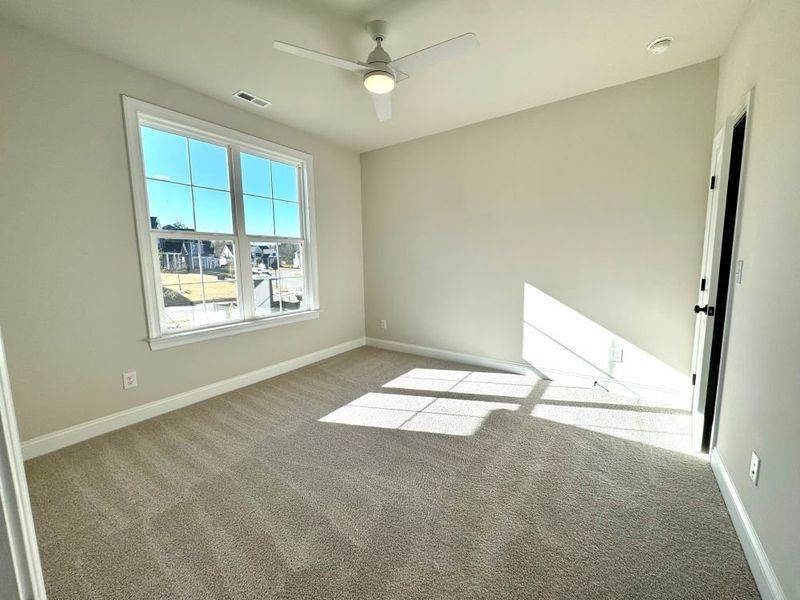 2 story home with a first floor main bedroom