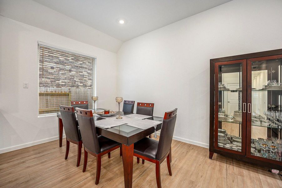 Bright and cozy breakfast nook just off the kitchen and living space Bright and cozy breakfast nook just off the kitchen and living space