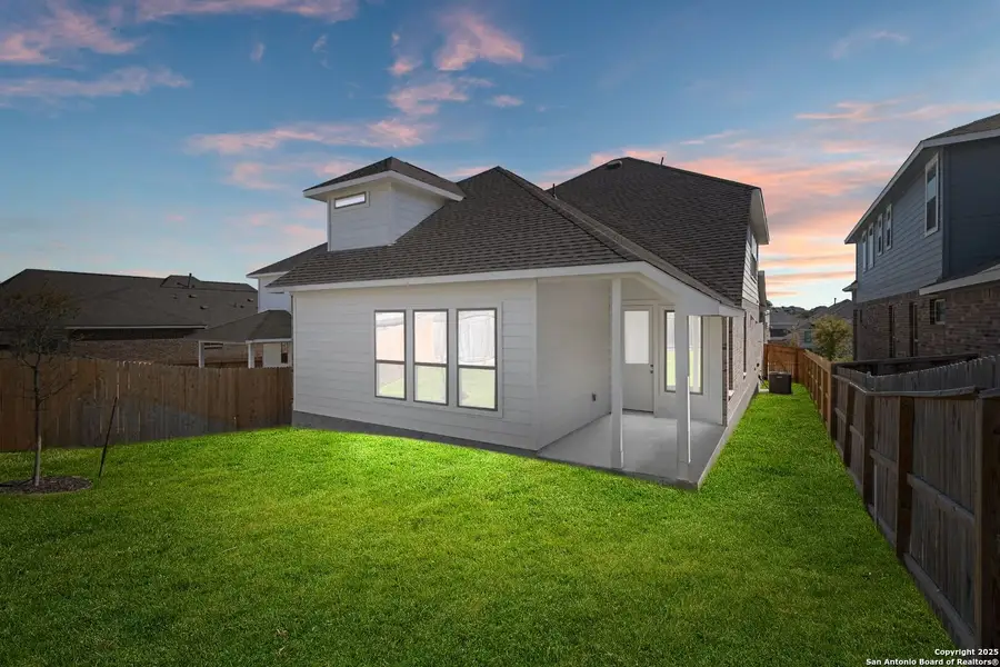 Front exterior of a new home in Ladera, San Antonio, TX, highlighting curb appeal (Image 2). Front exterior of a new home in Ladera, San Antonio, TX, highlighting curb appeal (Image 2).