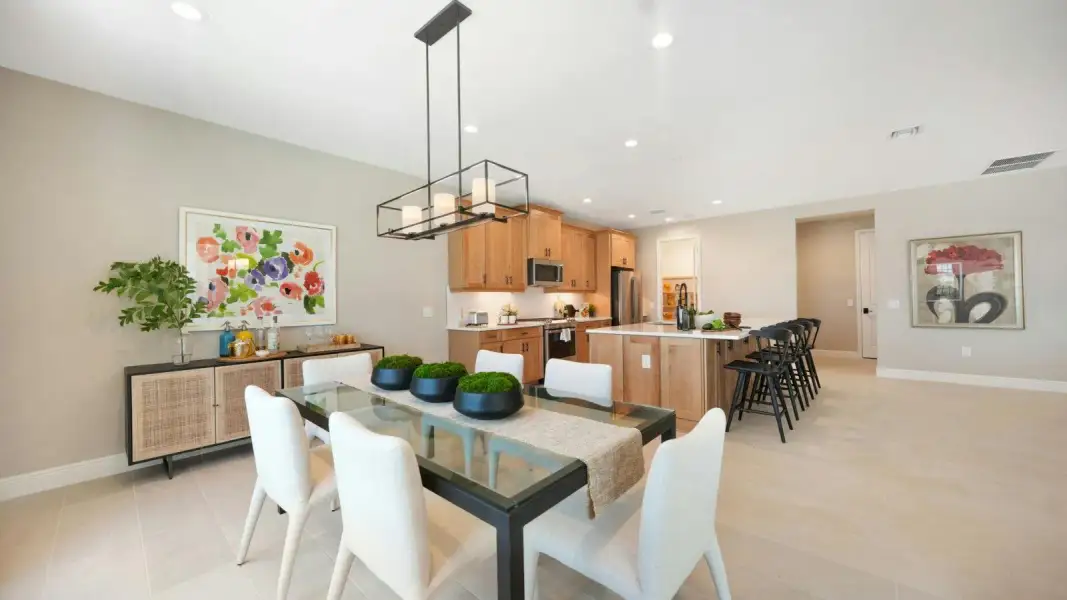 Furnished interior view inside a new home in Kingston South Real Estate and Homes for Sale in Estero, FL - Neal Communities, Estero (Image 12).