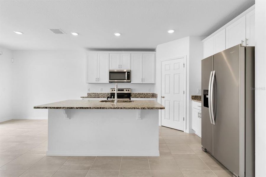 Furnished interior view inside a new home in Lawson Dunes - Signature Series, Haines City (Image 7).
