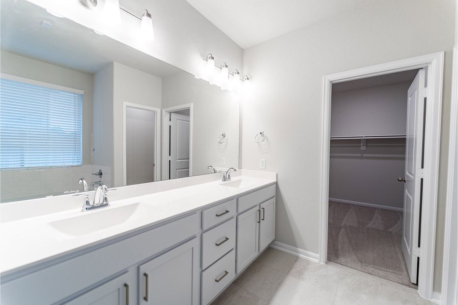 Furnished interior view inside a new home in Creekhaven, Iowa Colony (Image 7).