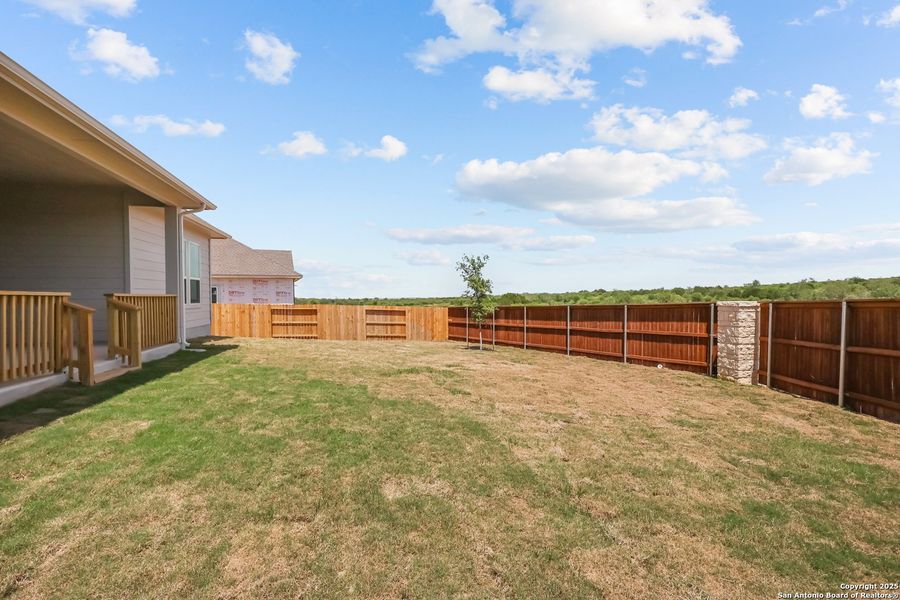 Front exterior of a new home in Homestead, Schertz, TX, highlighting curb appeal (Image 20).