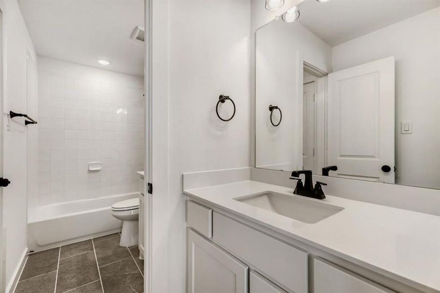Furnished interior view inside a new home in Castle Hills Northpointe - Townhomes, Lewisville (Image 10).