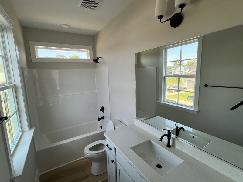 Furnished interior view inside a new home in Heritage Walk, Chattanooga (Image 11).