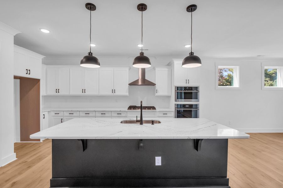 Representative furnished interior of a home built from the The Bradley by RobuckHomes in Windwater, Hampstead (Image 44).