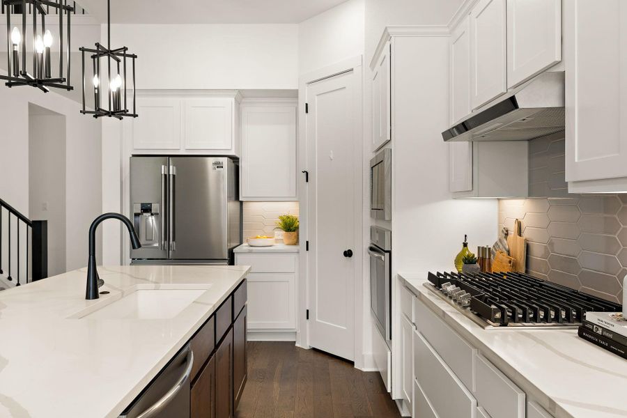 The gas cooktop is ready to fire up those meals. The gas cooktop is ready to fire up those meals.