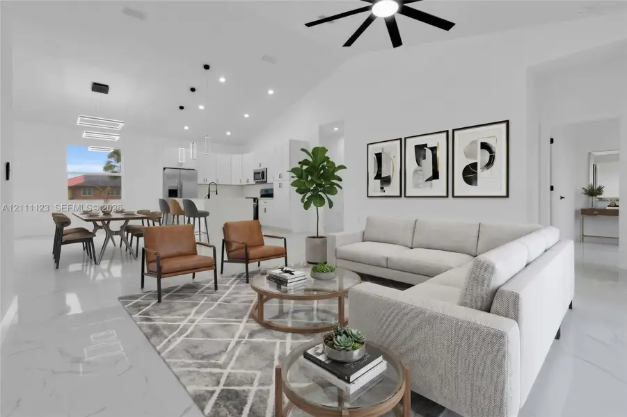 Virtually Staged: living and dining area shown with furniture.