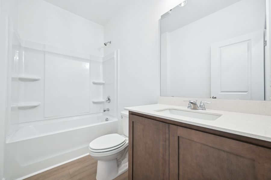 Representative furnished interior of a home built from the Meadow by Ashton Woods in Middleton Farms, Middlesex (Image 8).