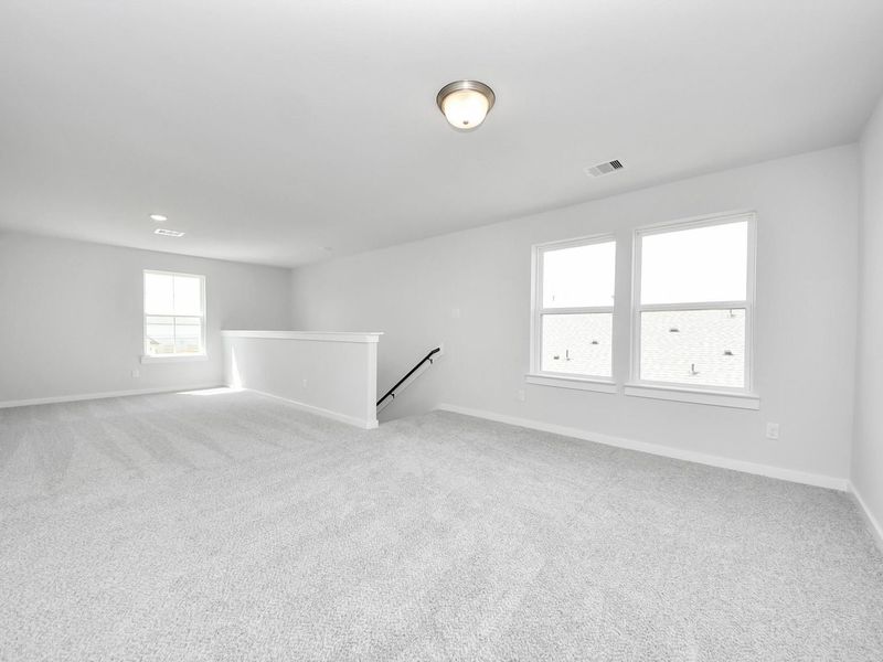 Spacious, unfurnished interior of a new home in Sunterra, Katy (Image 24).
