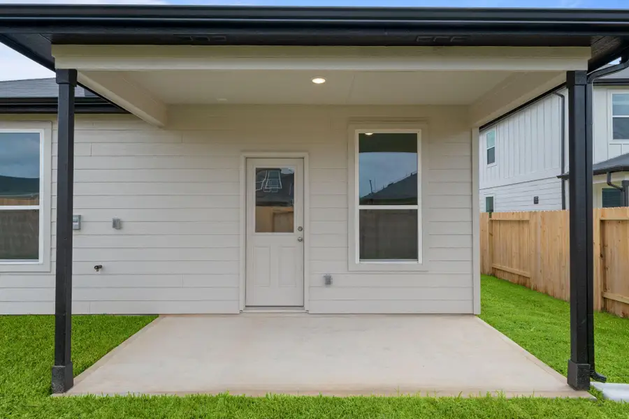 Exterior details and patio area of a home in Montgomery Bend, Montgomery (Image 3).