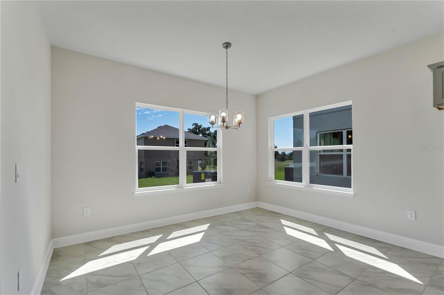 Representative unfurnished interior of a home built from the 2202- by Adams Homes in Winding Oaks, Weeki Wachee (Image 11).