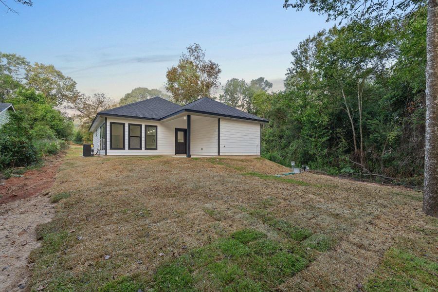 Exterior details and patio area of a home in , Willis (Image 3). Exterior details and patio area of a home in , Willis (Image 3).