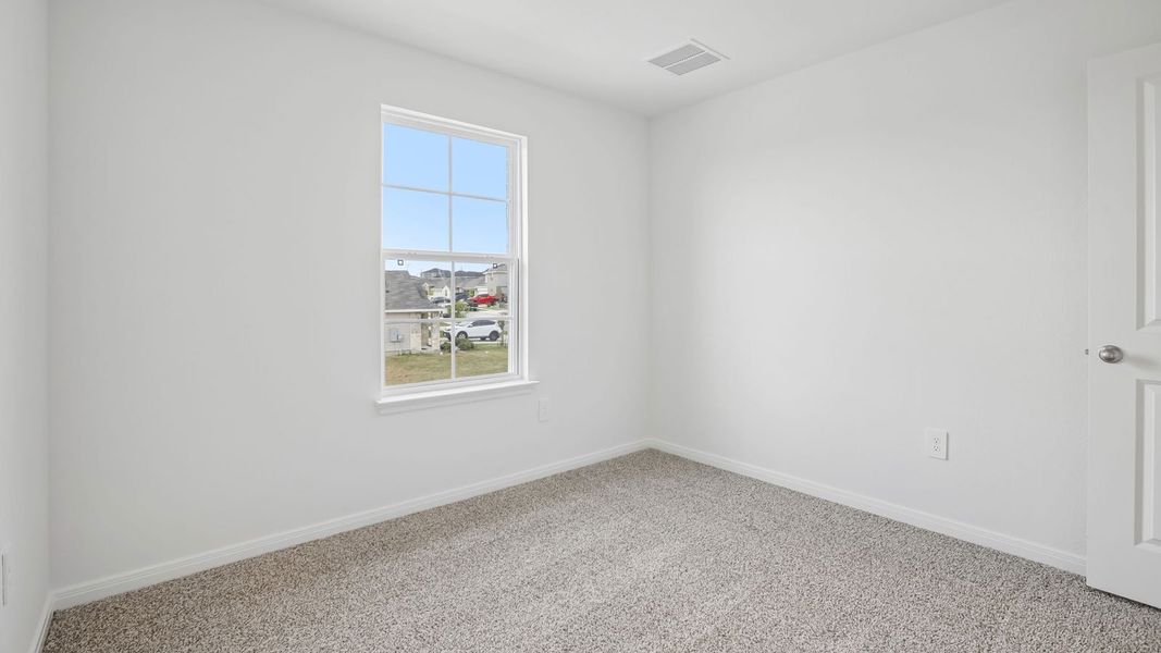 Spacious, unfurnished interior of a new home in Prairie Lakes, Buda (Image 39).