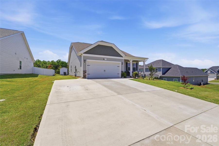 Front exterior of a new home in , Rock Hill, SC, highlighting curb appeal (Image 20).