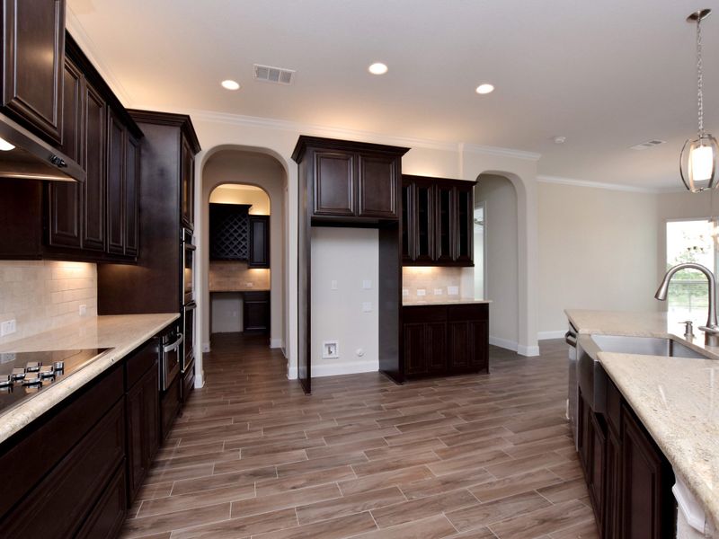 Representative furnished interior of a home built from the San Simeon I by Giddens Homes in Clearwater Ranch, Liberty Hill (Image 328).
