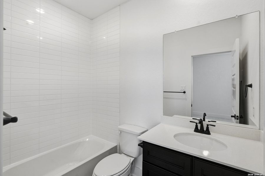 Furnished interior view inside a new home in Prominence Urban, San Antonio (Image 19).