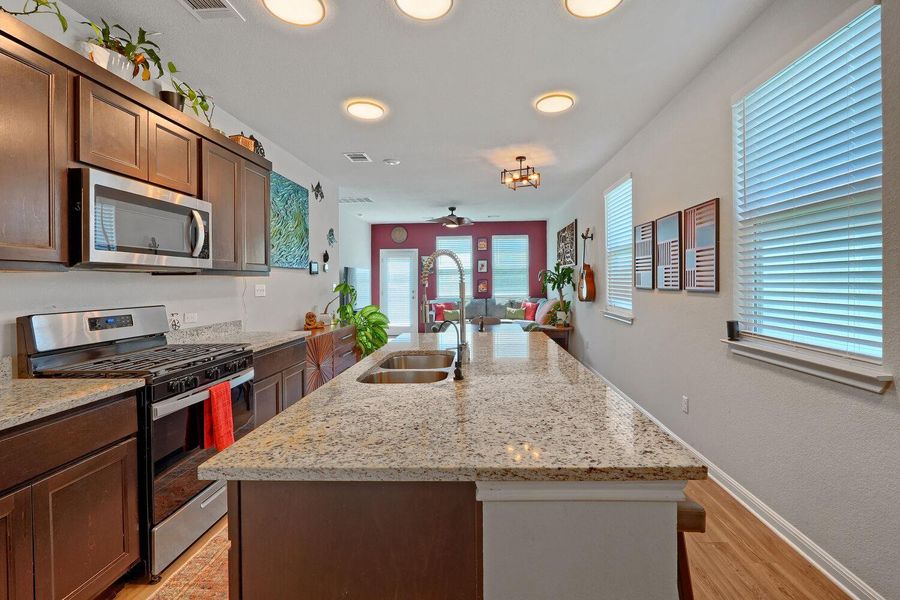 Furnished interior view inside a new home in Stallion Run, Buda (Image 11).