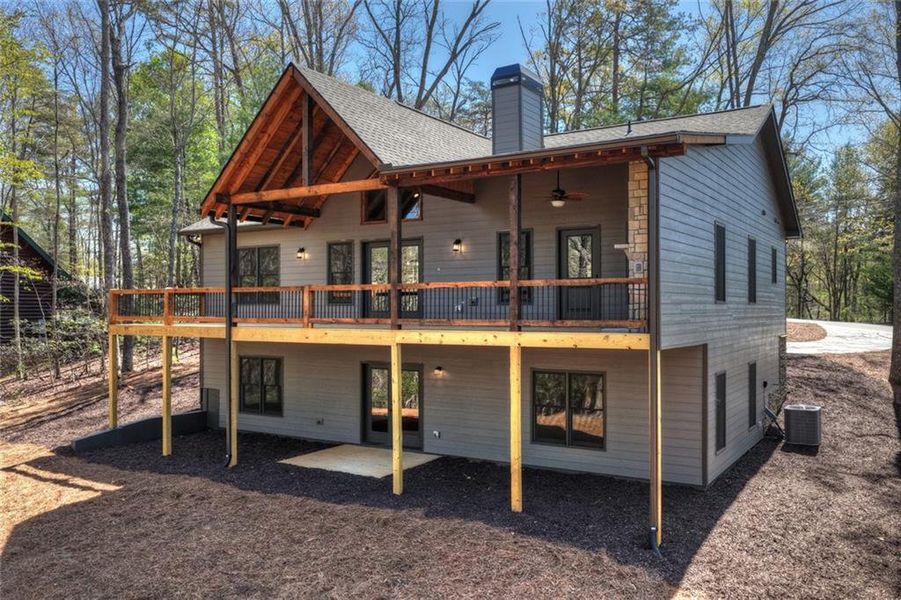 Exterior details and patio area of a home in , Ellijay (Image 25).