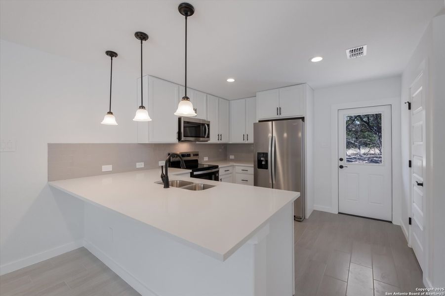 Furnished interior view inside a new home in , Bandera (Image 9). Furnished interior view inside a new home in , Bandera (Image 9).