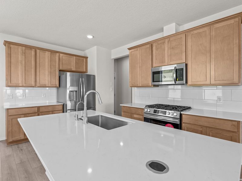 Furnished interior view inside a new home in Meadows at Oak Creek, San Antonio (Image 8).