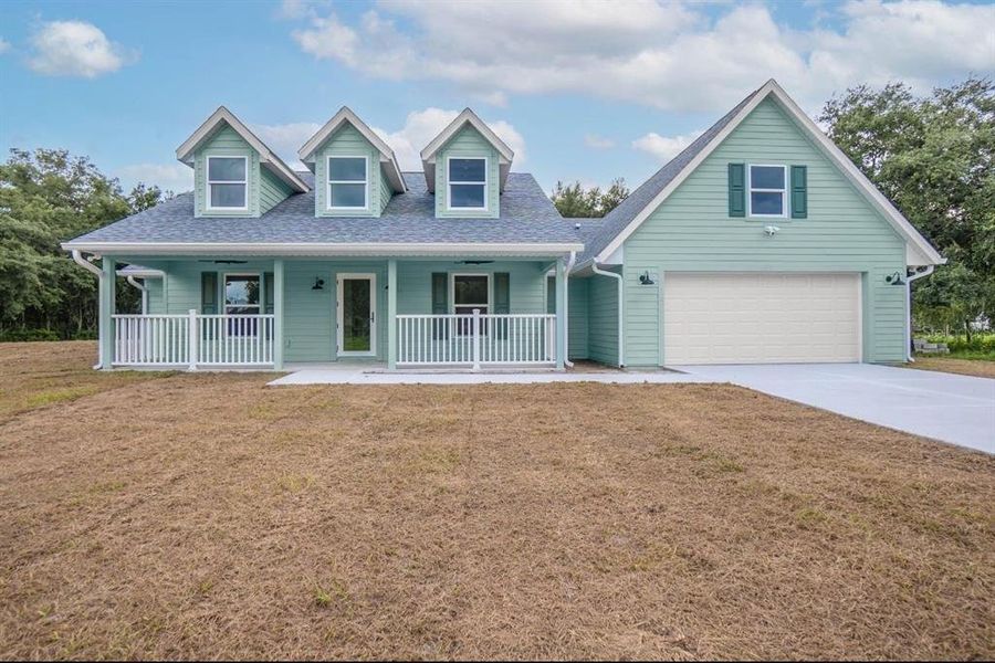 Front exterior of a new home in , Webster, FL, highlighting curb appeal (Image 21).