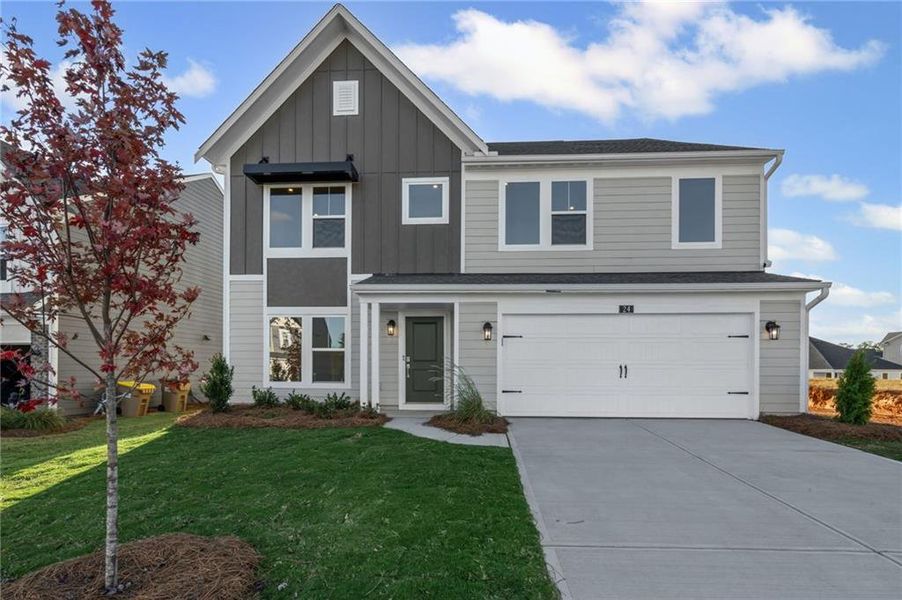 Front exterior of a new home in Twin Lakes, Hoschton, GA, highlighting curb appeal (Image 20). Front exterior of a new home in Twin Lakes, Hoschton, GA, highlighting curb appeal (Image 20).