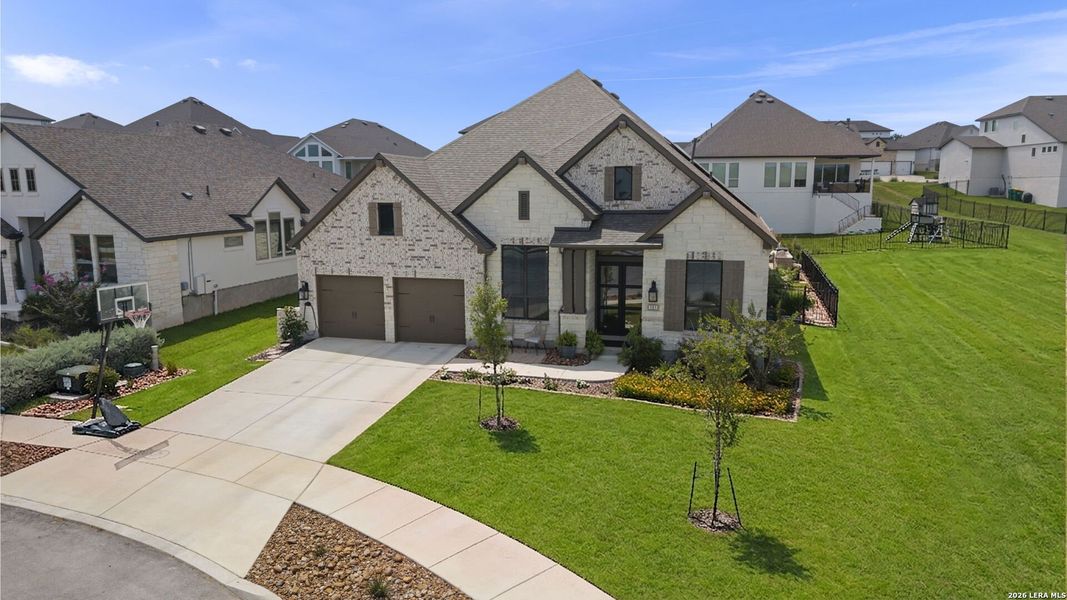 Front exterior of a new home in Esperanza, Boerne, TX, highlighting curb appeal (Image 20).