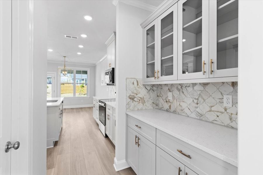 Messy Kitchen | 264 Prominence Drive, Ivey Homes Mill Creek Plan Messy Kitchen | 264 Prominence Drive, Ivey Homes Mill Creek Plan