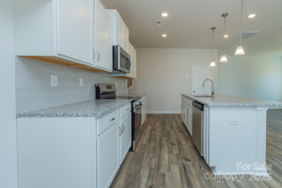 Furnished interior view inside a new home in Country Club Village, Salisbury (Image 10).