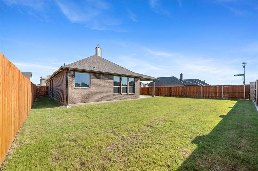 Exterior details and patio area of a home in Northstar, Haslet (Image 19).