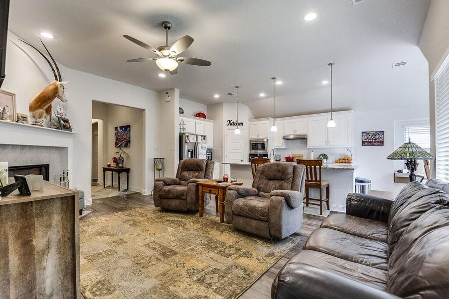 The open floor plan creates an inviting atmosphere that's perfect for hosting gatherings with family and friends.