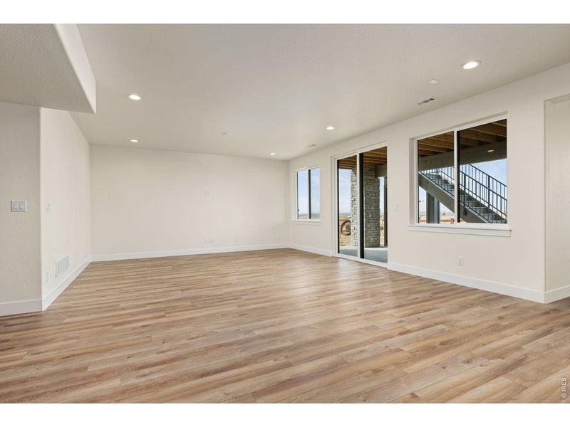 Spacious, unfurnished interior of a new home in RainDance, Windsor (Image 33).