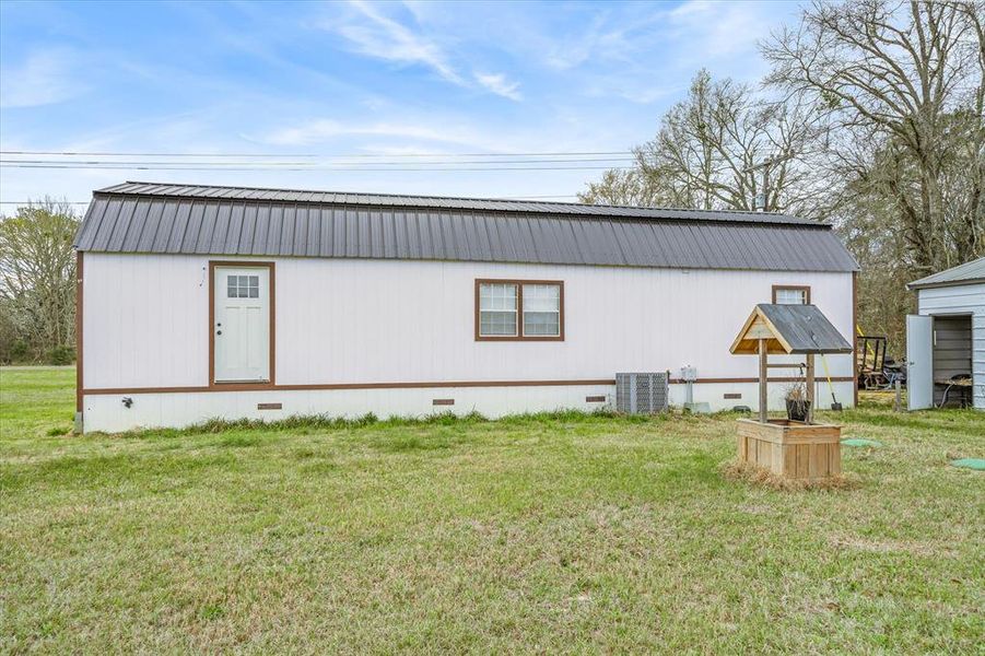 View of outdoor back side of home