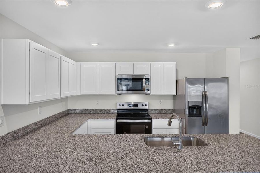 Furnished interior view inside a new home in , Punta Gorda (Image 16). Furnished interior view inside a new home in , Punta Gorda (Image 16).