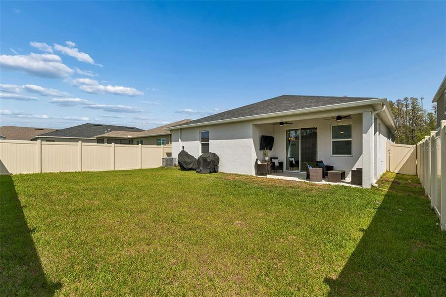 Exterior details and patio area of a home in Riverstone, Land O' Lakes (Image 26). Exterior details and patio area of a home in Riverstone, Land O' Lakes (Image 26).