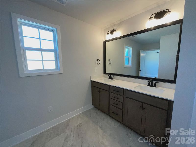 Furnished interior view inside a new home in Pine Trace, Gastonia (Image 10).
