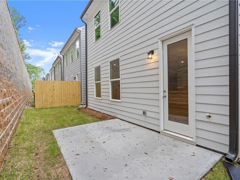 Exterior details and patio area of a home in The Village at Shallowford, Kennesaw (Image 2).