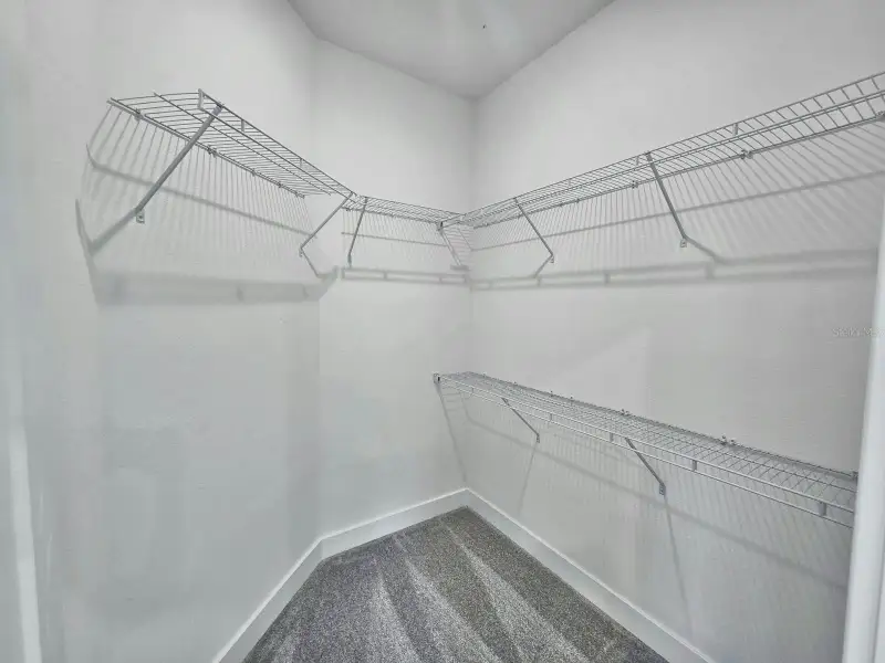 Spacious, unfurnished interior of a new home in Harmony Central, St. Cloud (Image 14).