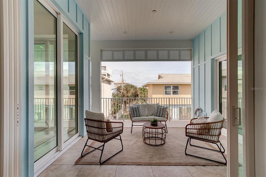 Exterior details and patio area of a home in , New Smyrna Beach (Image 26).
