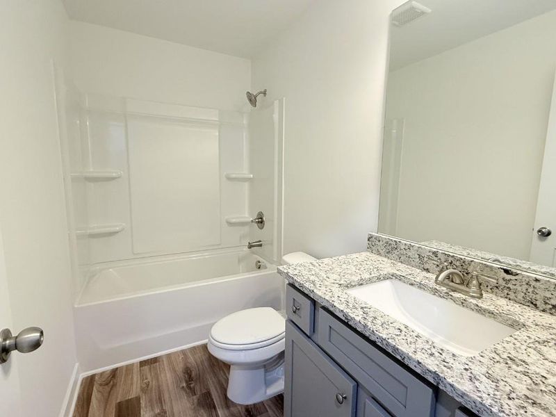 Furnished interior view inside a new home in Sutton's Landing, Statham (Image 9).