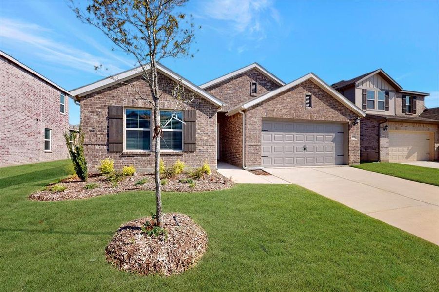 Front exterior of a new home in Mobberly Farms, Pilot Point, TX, highlighting curb appeal (Image 15).