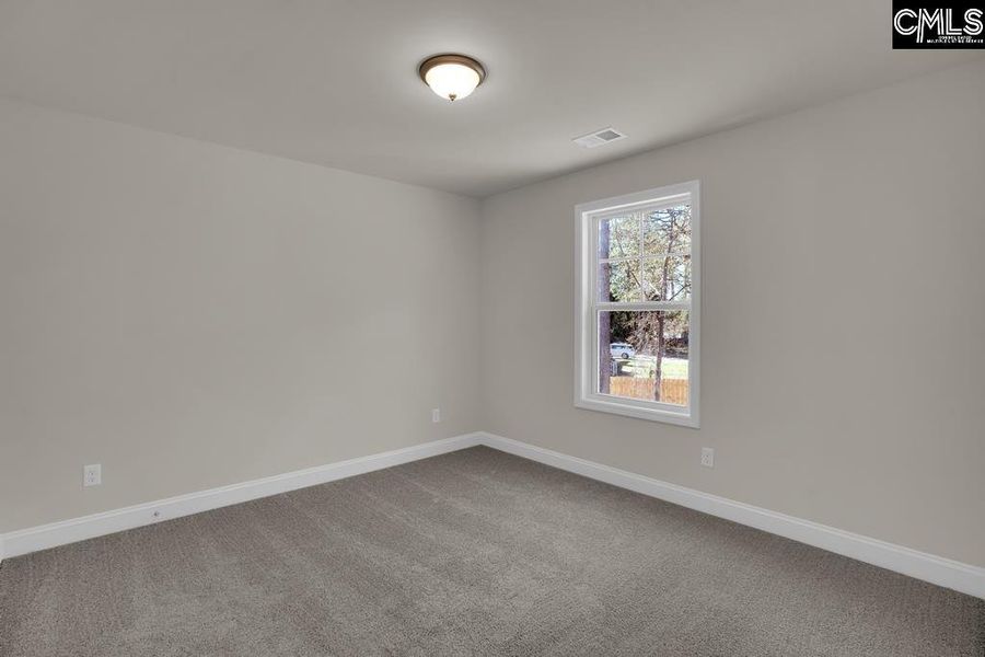 Spacious, unfurnished interior of a new home in Cottages at Roofs Pond, West Columbia (Image 33).